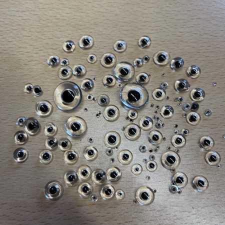 Crystal eyes with a black pupil. Approx. 120 eyes - Retail Value £60+