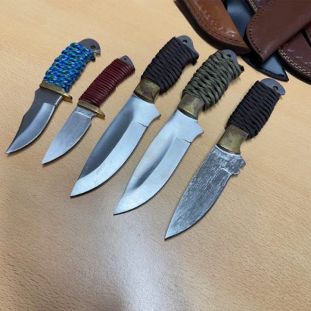 Five Paracord handled knives